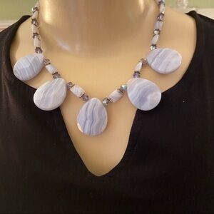 Lilac teardrop stone necklace with purple crystal beads and faceted tube beads.